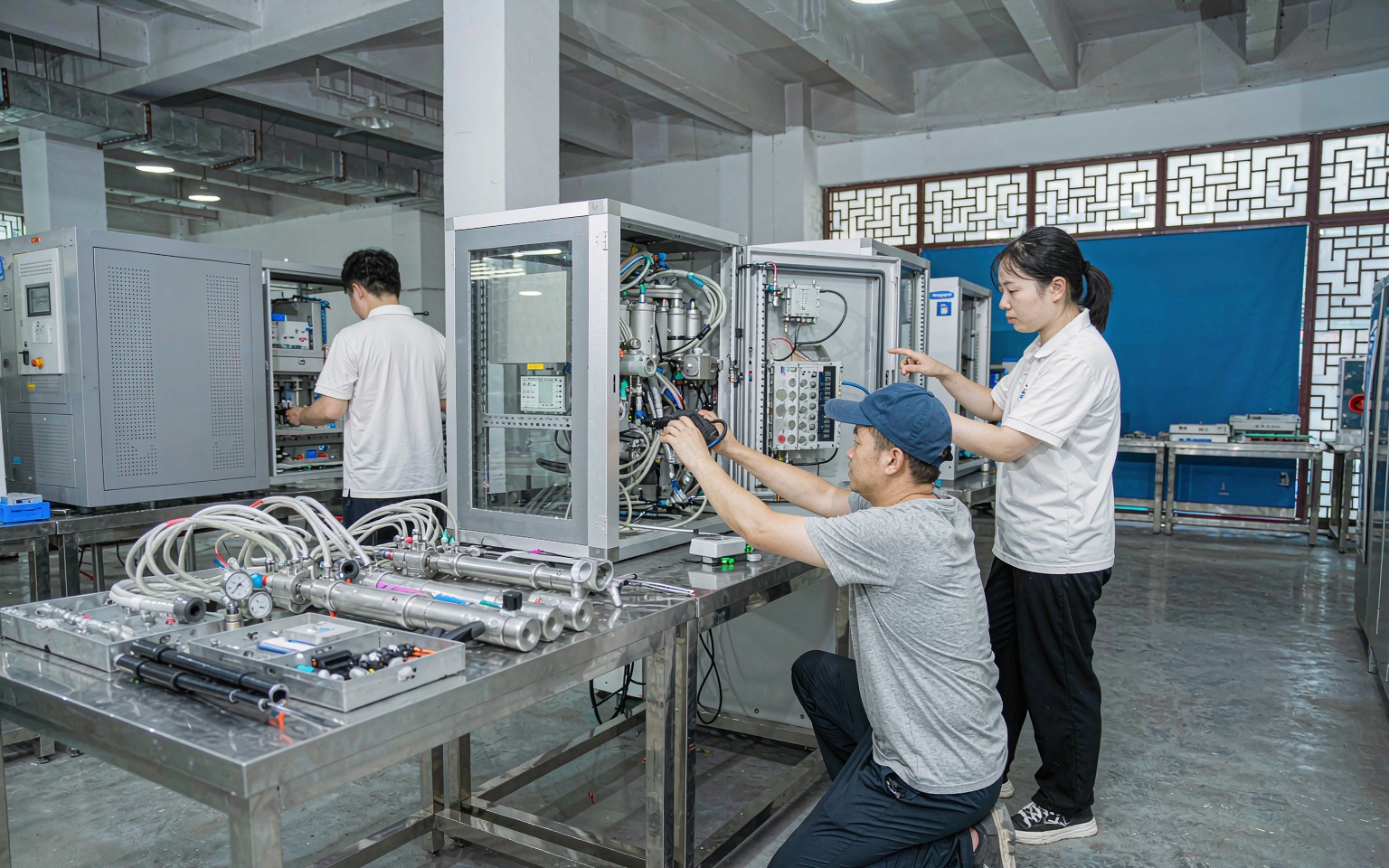 Engineers assembling a cryoablation treatment console